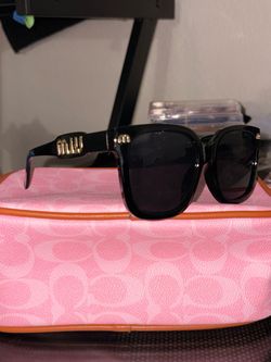 MIU MIU sunglasss
