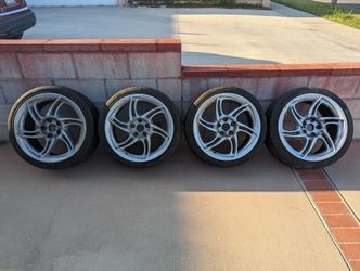 Momo Twin 6 Spoke/12 Spoke with 17x7 (4) Wheel Rims 5x114.3 Bolt Pattern