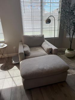 Living spaces chair with ottoman