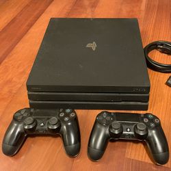PS 4 Pro & Two Controllers