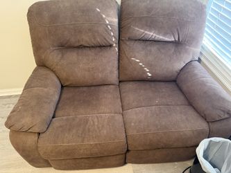 Brown Reclining loveseat