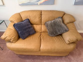Like-new leather love seat