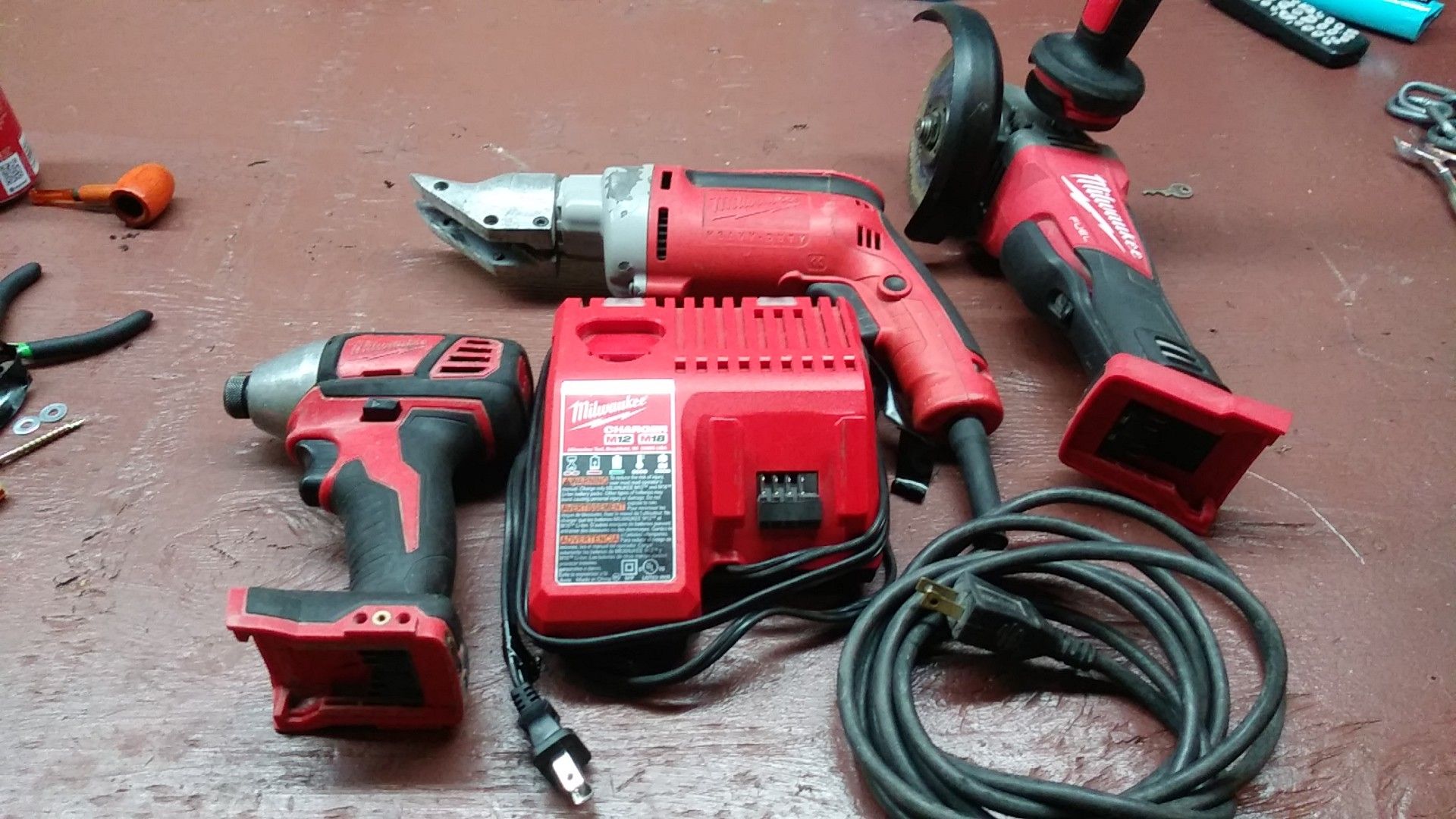 Milwaukee impact drill milwaukee grinder charger m12 m18 milwaukee sheer but sheer is missing cutting attachments