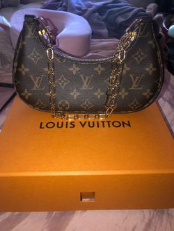 Louis Vuitton clutch purse