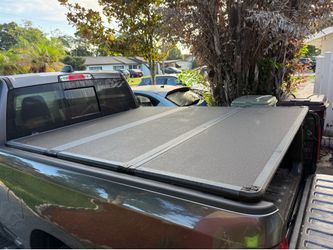 Stirrups, 6'4" bed cover and hitch ball, all together for that price
