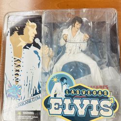 Two Separate Elvis Presley Collectable Figurines 