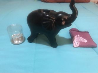 Ceramic and glass elephants and zebra bag