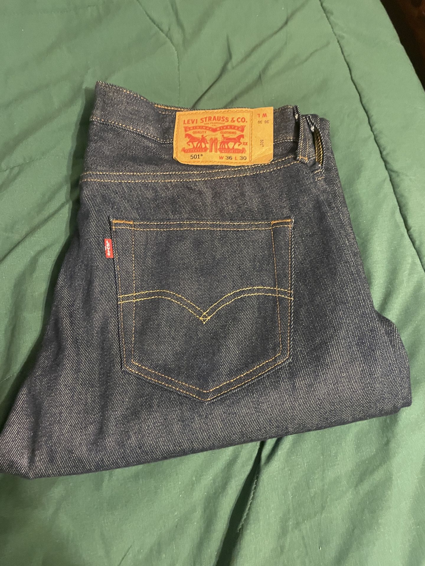Dark blue Levis 501’s