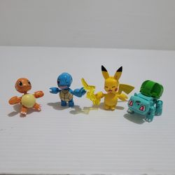 Lot of 4 Mega Construx Pokemon Figures Pikachu Squirtle Bulbasaur Charmander.
