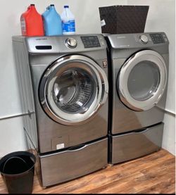 Samsung Front-Load Washer and Dryer Set with Pedestals
