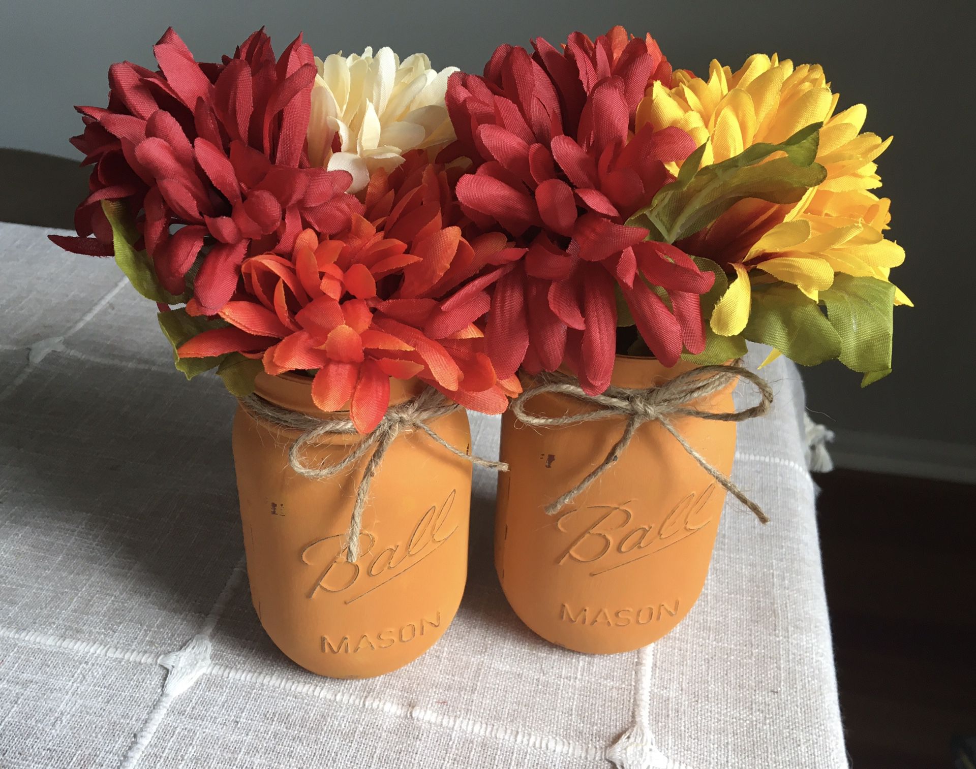 Distressed mason jar vases with flowers included!! Jar/flower choices shown in photos