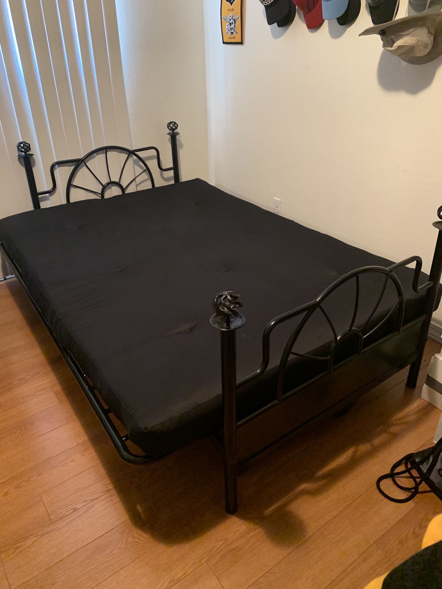 Black metal futon with queen size mattress