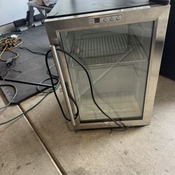 Mini Fridge With Clean Glass Door.