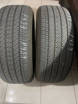 275/50/22. Two used Bridgestone tires please read description good/great tread.