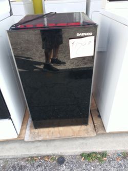 Dorm Refrigerator black excellent . Warranty . Delivery available . 2203 Fowler st. Ft. Myers 33901