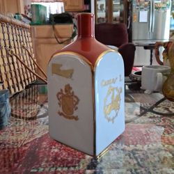 collectible vintage ceramic porcelain decanter, specifically a Carlos I Bidasoa Imperial Spanish Brandy bottle