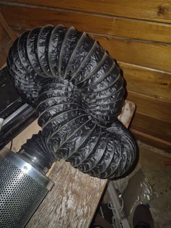 Turbo ventilation fan, hose, and particulate filter.