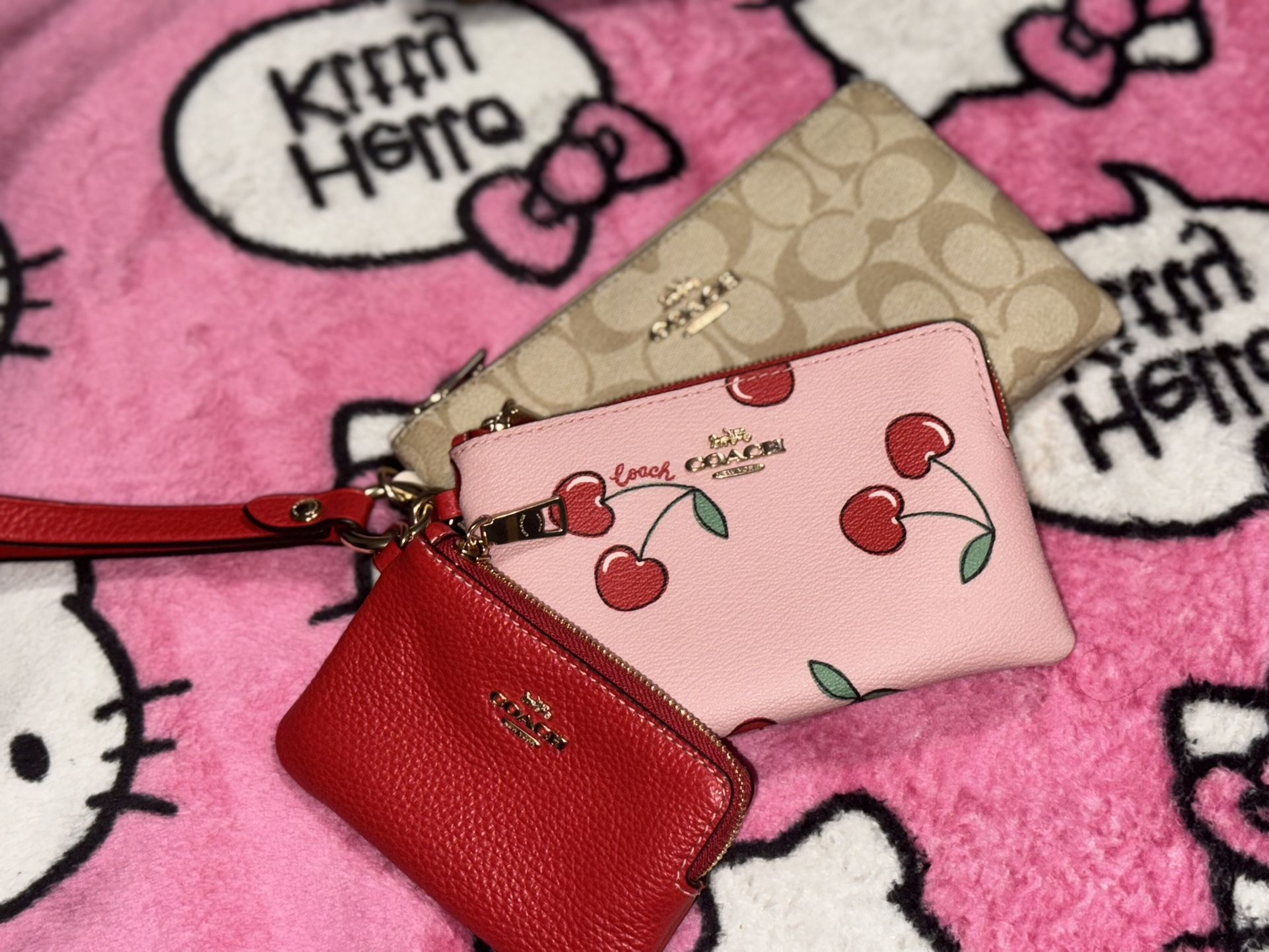 Coach Corner Zip Trio Wristlet In Signature Canvas And Hearts