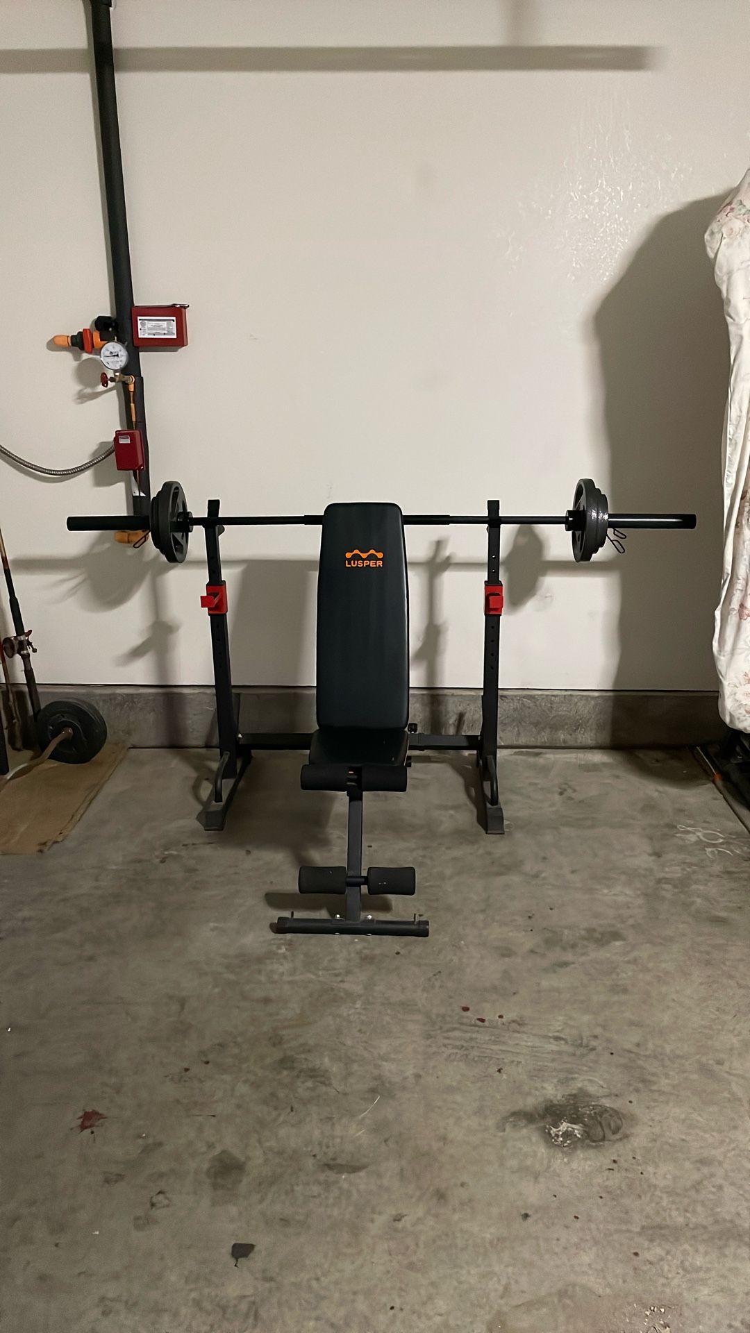Bench/Squat Rack with weight plates and bar