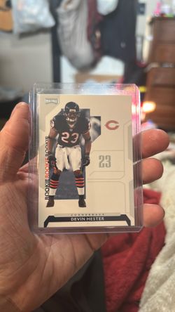2006 Donruss Playoff #103 rookie card features Chicago Bears cornerback Devin Hester.
