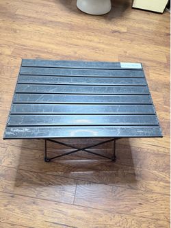 $5 table Charles Conrad Cir