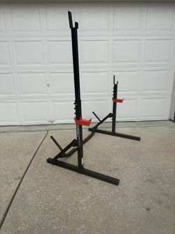 Sunny Health & Fitness Multifunctional Adjustable Bench Press Squat Rack  $110   