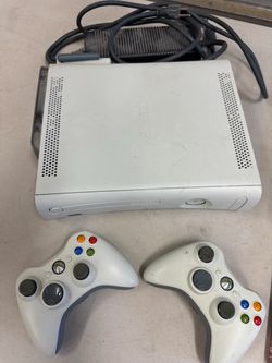 Xbox 360 with controllers and games