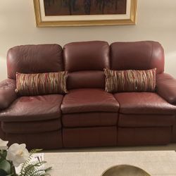 Beautiful Reddish Burgundy Leather Sofa with 2-Power Recliners.  Also matching Loveseat for $100 more.