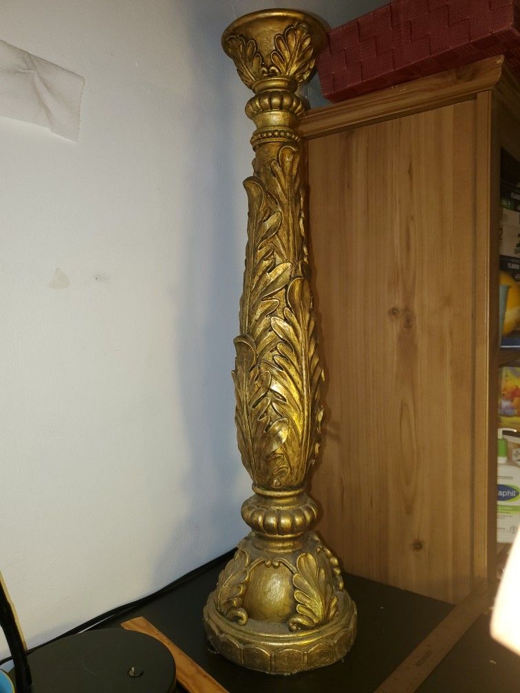 an ornate, gold-finished pedestal or candal holder, plant stand, display column,Pillar
net weight 7lbs 4 7/8" diameter top, 7.25" diameter bottom, abo