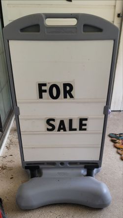 Plastic business sign
