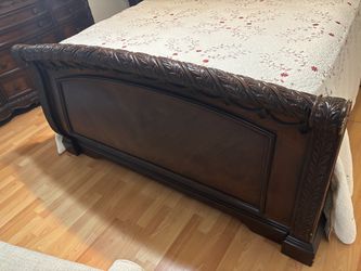 Dark Wood Sleigh Bed Frame with Carved Detail
