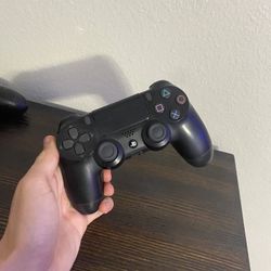 2 PlayStation Controllers 