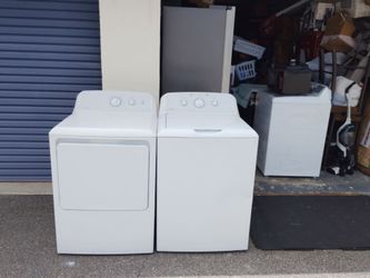 Like new Hotpoint by GE top load full size tub washer dryer with warranty