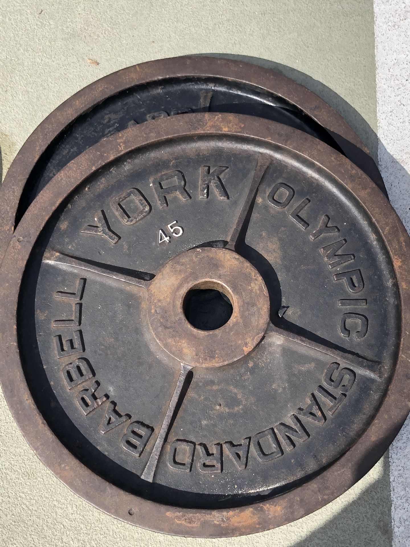 Pair of York 45lbs Olympic weight plates