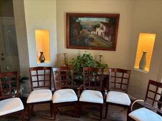 DINING ROOM SET OF 6 and table..not tears not stains