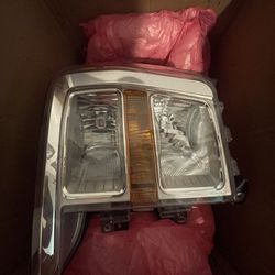 2022 ford f150 OE headlight assembly (left front, right front) both for $750.00