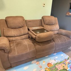 Two Sofas with recliners And Cupholders And Plug Points