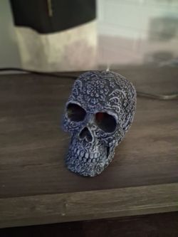 Red bleeding burning candle
