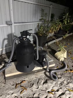 Pool Pump, Sand Filter, and Ladder