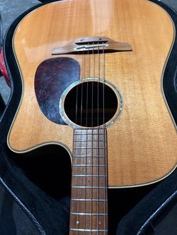 Tan 16 6 string Takamine