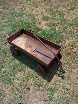 Old antique wagon in good shape for its age 75th Ave Indian School serious buyers only please solid not rusted through