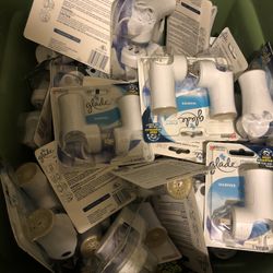 A Whole Tub Of Brand New Glade, Air Wick, And Fe breeze Plug Ins. Great For Resellers. 