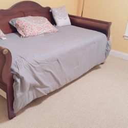 Sturdy & Well Maintained Trundle Bed Includes Both Slightly Slept On Mattresses.