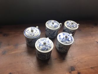 Blue ware cups with lids
