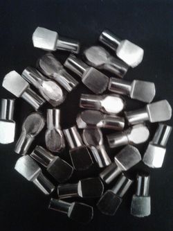 Shelf pins for cabinets 7mm, new . 25 total.