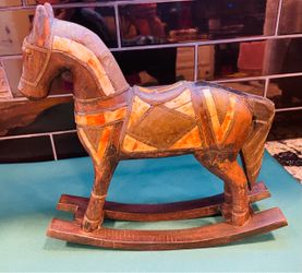Beautiful hand carved wooden/brass/inlaid bone rocking horse
