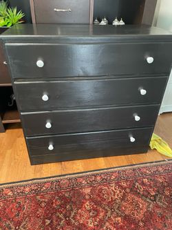 Nice black wood dresser with 4 drawers