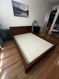 Disassembled Wooden Queen Size Bed Frame