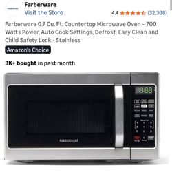 Farberware 0.7 Cu. Ft. Countertop Microwave Oven – 700 Watts Power, Auto Cook Settings, Defrost, Easy Clean and Child Safety Lock - Stainless