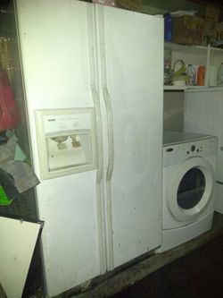 Kenmore side-by-side refrigerator freezer with ice maker